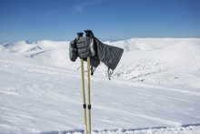 Ski Poles Kept By Invisible Skier In Gloves
