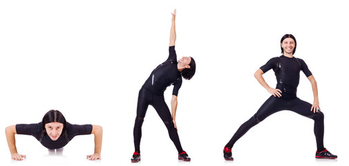 Wall Mural - Young man doing exercises on white