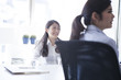© Monet - Women who are working in bright office