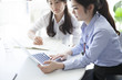 © Monet - Business women have to work with a laptop