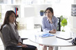 © Monet - Business woman working in the office