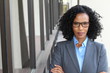 © ajr_images - Portrait in full growth. Very confident, powerful and aggressive Businesswoman wearing glasses crossing her arms with copy space