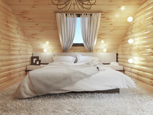 Bedroom Interior In A Log On The Attic Floor With A Roof Window.