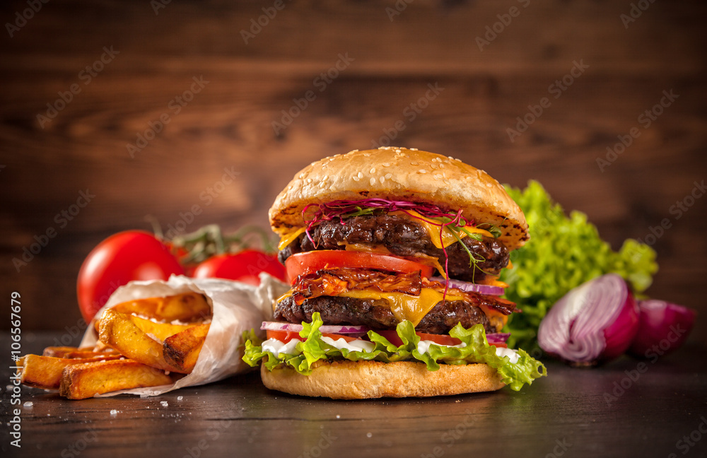 Fresh home-made hamburger served on wood - obrazy, fototapety, plakaty 