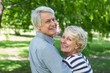 © WavebreakMediaMicro - Rear view of senior couple embracing
