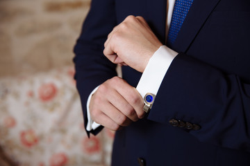 Wall Mural - Gentlemans hands with cufflinks