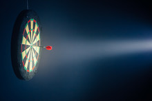 Darts Board Illuminated With A Spotlight