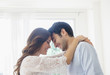 © JGI/Jamie Grill/Blend Images - Smiling couple hugging