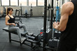 © eric - Muscular woman doing pulling exercises