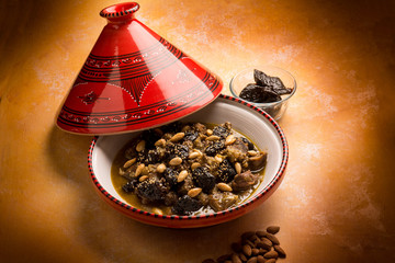 Poster - tajine with meat plum almond and sesame seeds