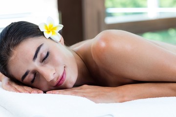 Wall Mural - Woman relaxing on massage table