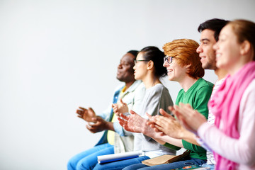 Wall Mural - Students clapping hands