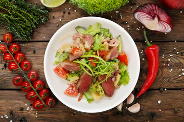 Wall Mural - Restaurant food closeup - salad with prosciutto