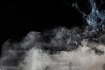 Smoke fragments on a black background