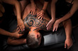naked girl doing massage a man with a tattoo on her back