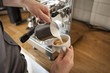 © Westend61 - Cappuccino, man pouring milk froth in coffee cup