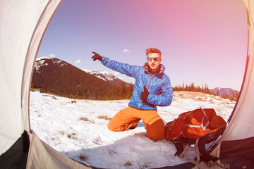 Wall Mural - Hiker in winter mountains.