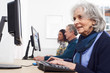 © highwaystarz - Senior Woman Attending Computer Class