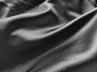 black satin textile, waved cloth