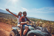 © Jacob Lund - Young couple enjoying quad bike ride
