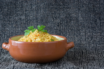 Wall Mural - Couscous with vegetables on tablecloth
