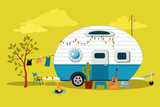 Fototapeta  - Cartoon travelling scene with a vintage camper, a fire pit, camping table and laundry line, EPS 8 vector illustration, no transparencies