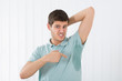 Man Pointing To A Sweat Armpit