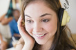 © JGI/Jamie Grill/Blend Images - Teenage girl listening to headphones