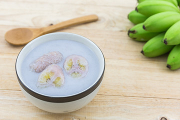 Wall Mural - Banana in coconut milk (Kluay Buad Chee), Thai desert.