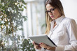 © Lumina Images/Blend Images - Caucasian businesswoman using digital tablet in office