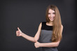 © stas_80 - beautiful smiling girl holding thumbs up