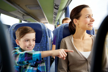 Canvas Print - happy family riding in travel bus