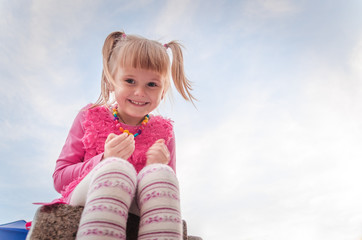 Happy child with pigtails