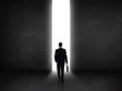 © ra2 studio - Business person looking at wall with light tunnel opening
