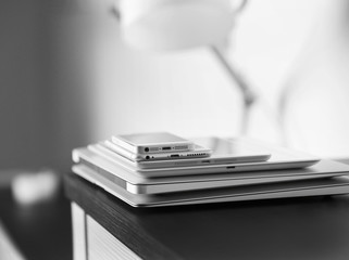 Canvas Print - Pile of electronic gadgets on the table. Communication and technology concept