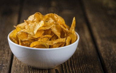 Portion of crispy Potato Chips (selective focus)