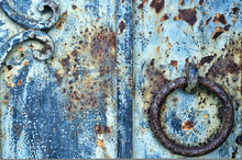 Detail Of Old, Rusty Door Knocker