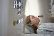 © Connect Images - Girl going into CT scanner