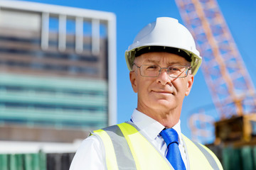 Engineer builder at construction site