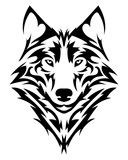 Fototapeta  - Beautiful wolf tattoo.Vector wolf's head as a design element on isolated background