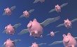 Flying piggybank pigs in the sky