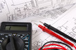 © bayurov - electrical engineering drawings and digital multimeter