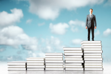 Poster - Businessman and books in sky