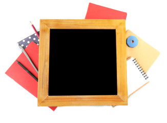 Wall Mural - Small school blackboard with stationery isolated on white