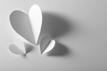 Wall Mural - Beautiful paper hearts on white background