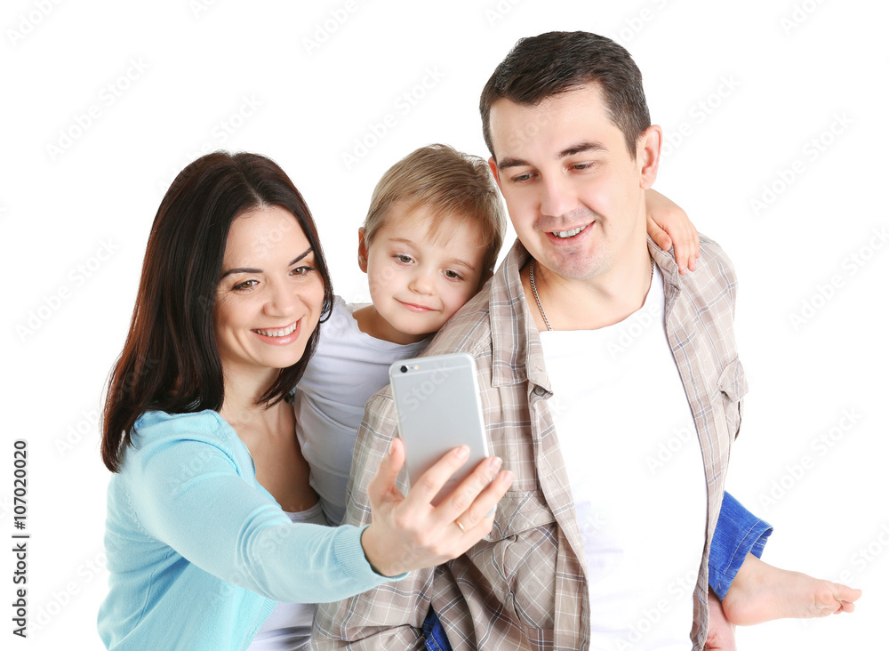 Happy family making selfie with mobile phone isolated on white