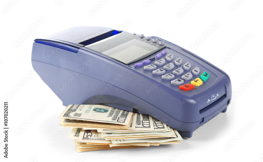 Credit card machine and dollar banknotes isolated on white