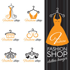 Wall Mural - Fashion shop logo - Orange Clothes hanger and dress and butterfly