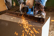 © idea_studio - Worker working of a grinding machine
