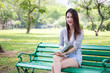 © tiniroma - Portrait of thai adult beautiful girl read a book